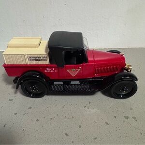 A Canadian Tire 1922 Studebaker Pick-up die-cast coin bank.